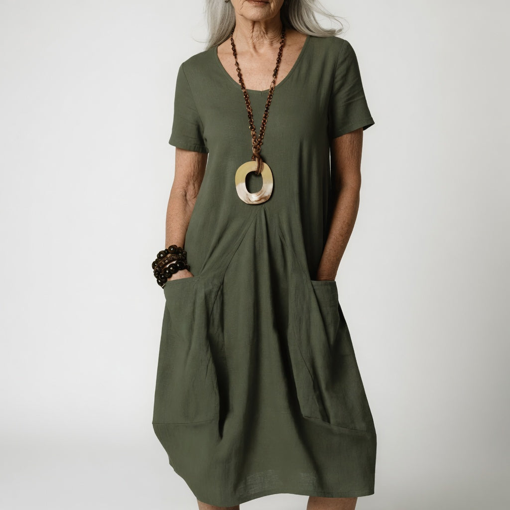 Céline™ — Elegant Flowing Dress with Flattering Belly Design