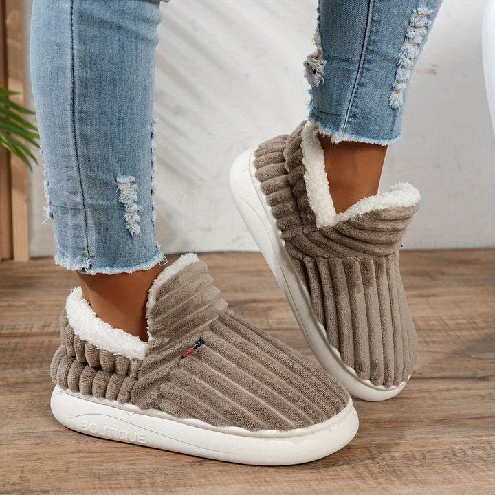 The CozyStep plush slippers