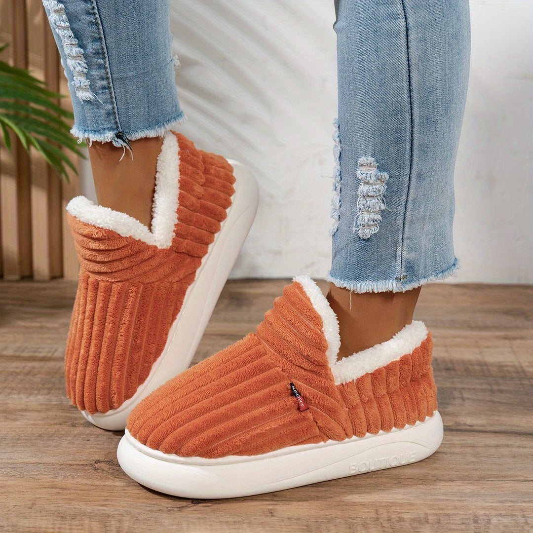 The CozyStep plush slippers