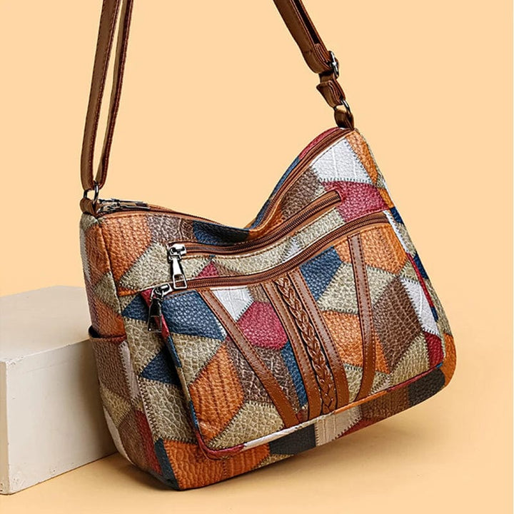 Solara™ | Mosaic pattern leather look handbag