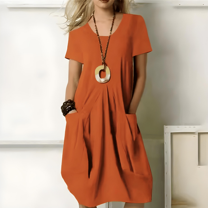 Céline™ — Elegant Flowing Dress with Flattering Belly Design